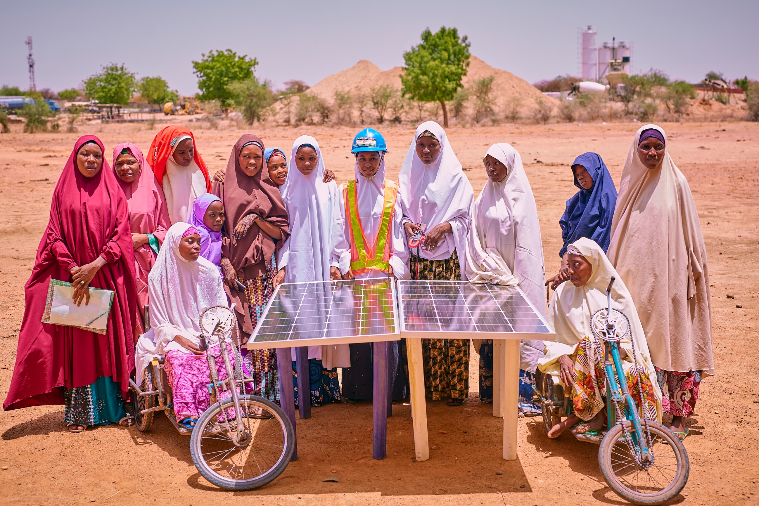 a group of people posing for the camera