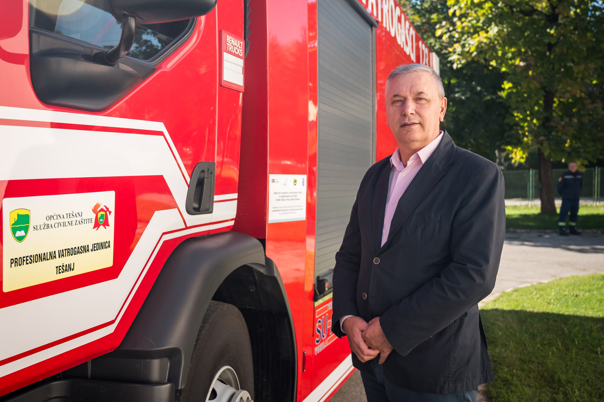 a man standing in front of a truck