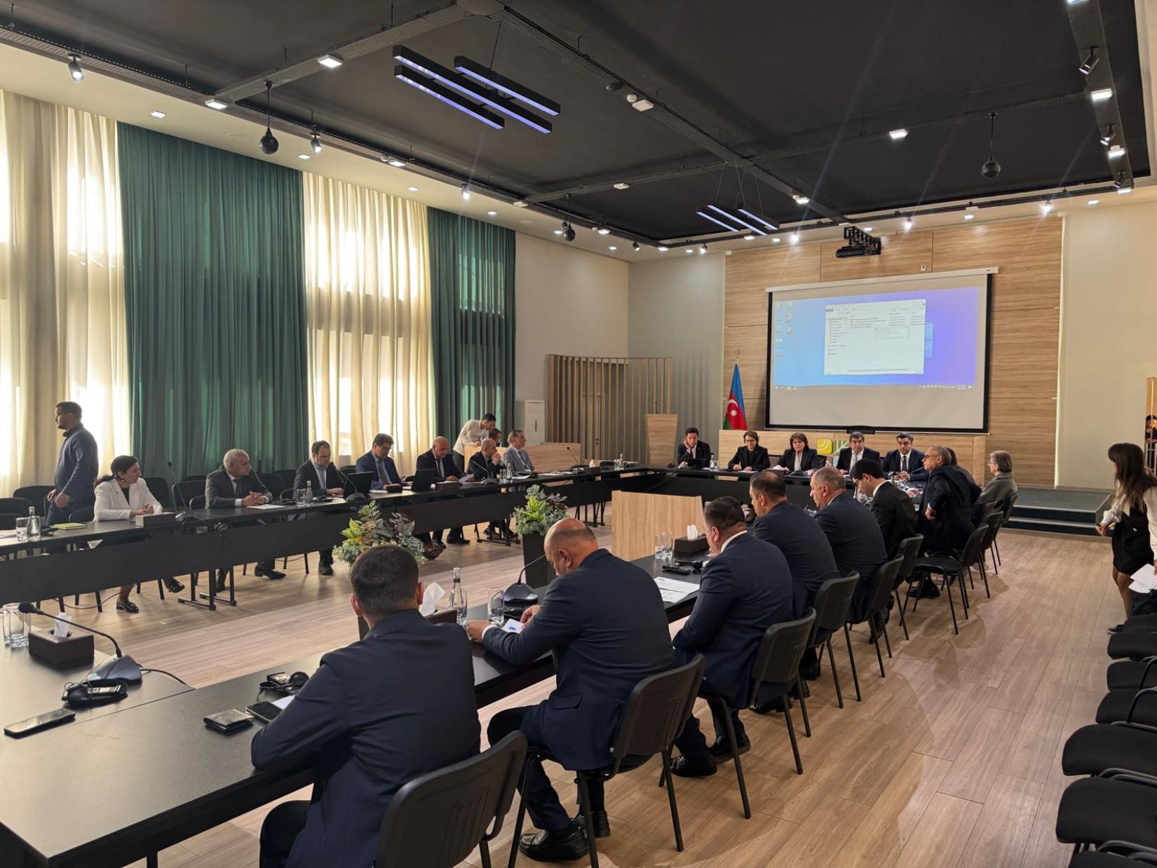 a group of people sitting at a table