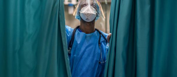 A health worker wearing protective gear